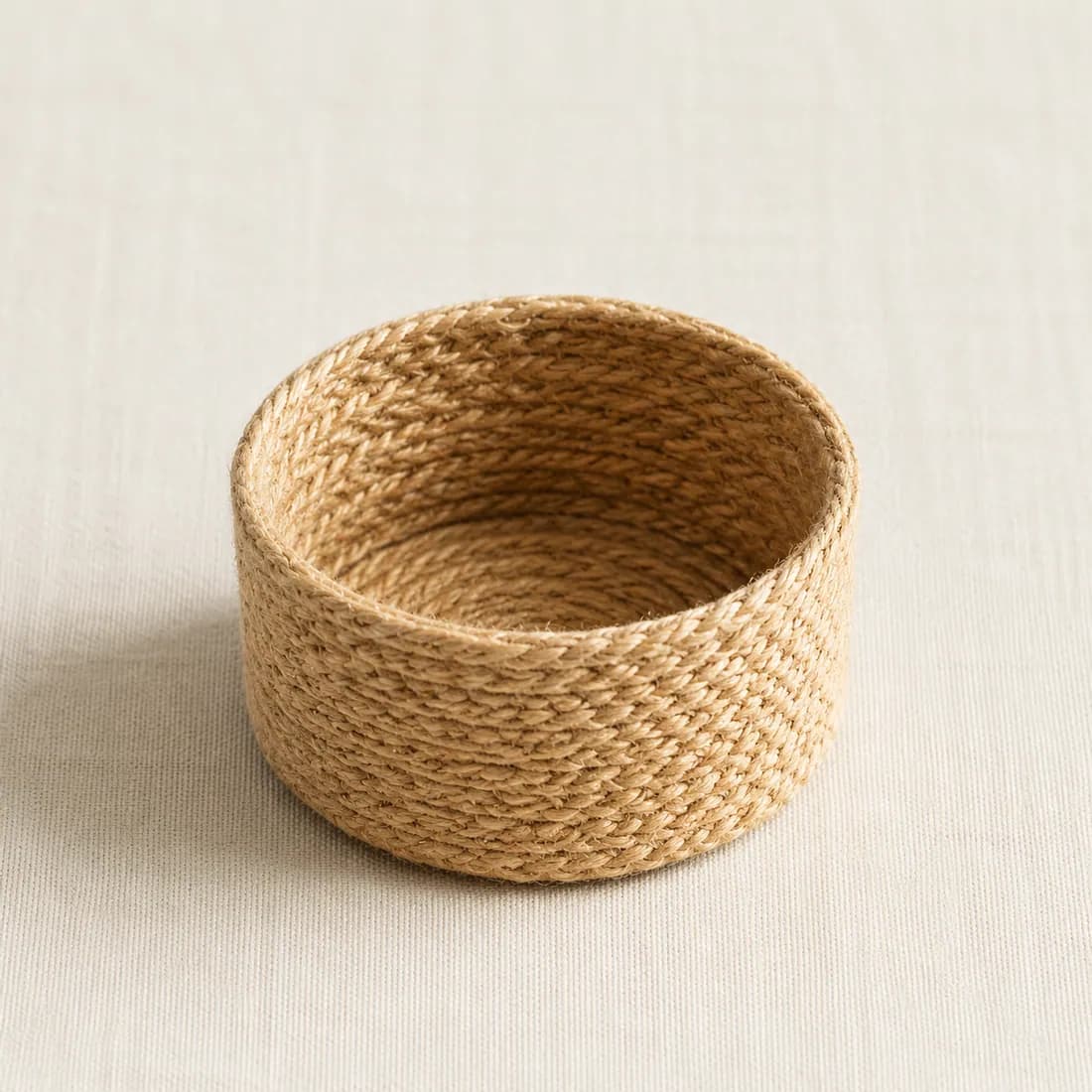 Cable Basket Ø15 — Jute — Jute weave, shown empty on a plain background