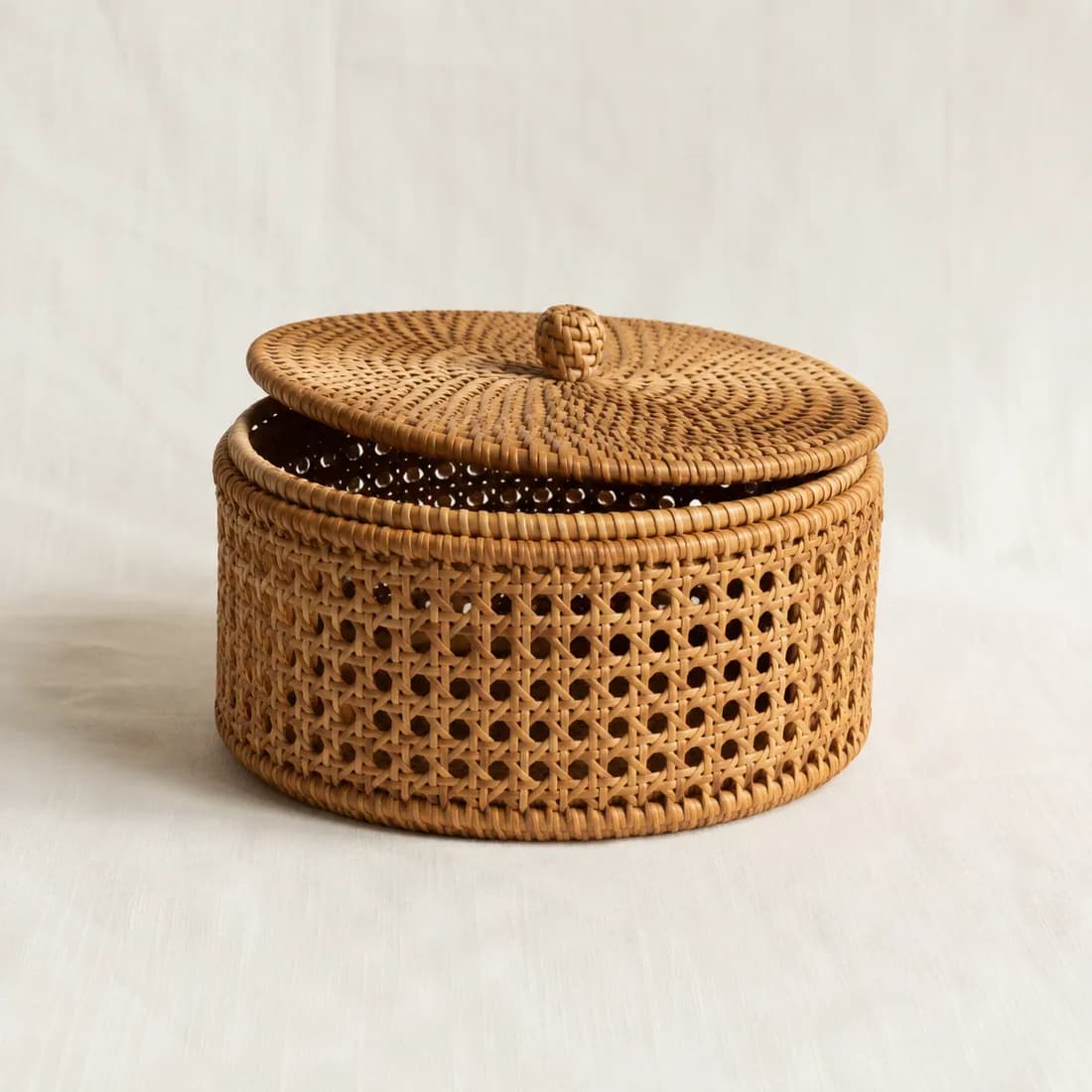 Lidded Basket Ø30 — Rattan — Rattan weave, shown empty on a plain background