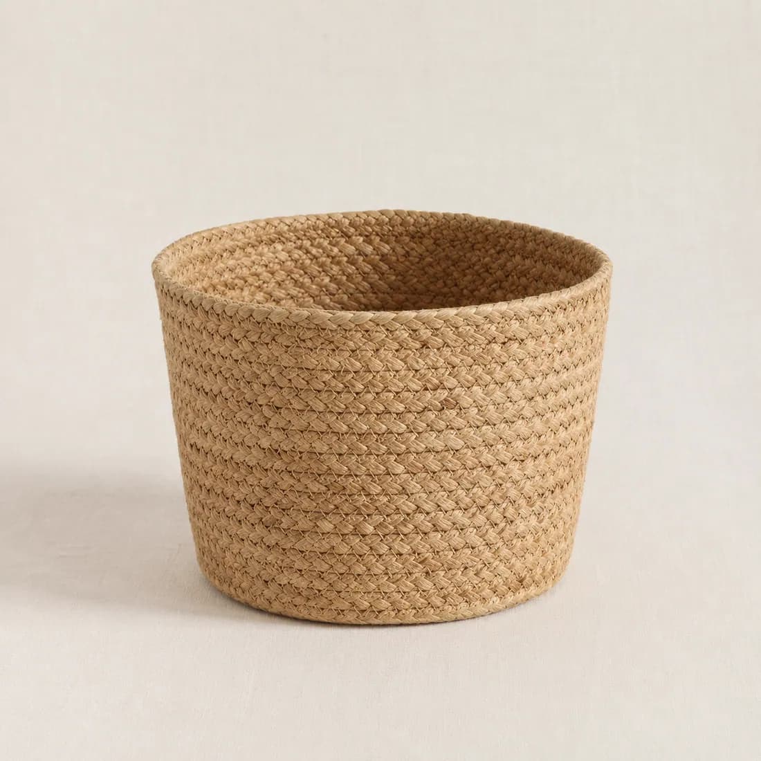 Pot Cover Ø24 — Water Hyacinth — Water hyacinth weave, shown empty on a plain background
