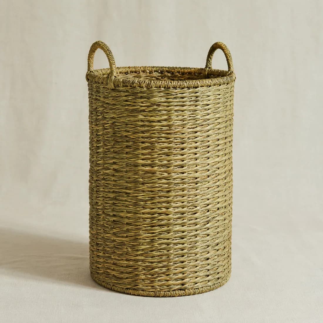 Tall Basket Ø28 H45 — Seagrass — Seagrass weave, shown empty on a plain background